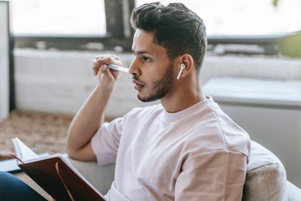 a man feeling comfort with earbuds